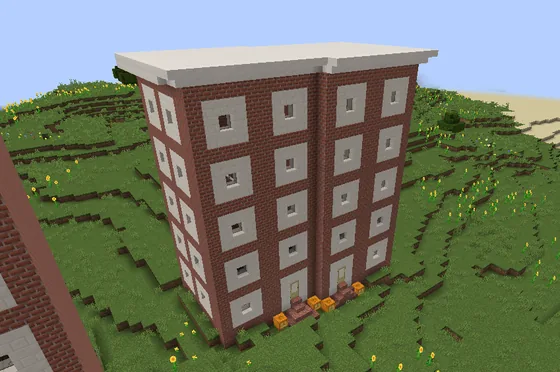 Small Brick Townhouse With Jack-o-Lanterns Minecraft schematic